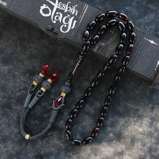 Gümüş kazaz püsküllü kalemkar işlemeli ateş kehribar kırmızı siyah tesbih modeli.